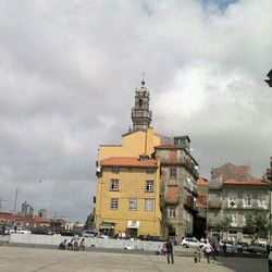 City street against cloudy sky