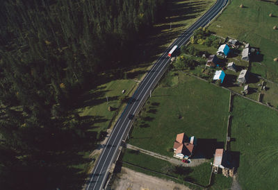 High angle view of road amidst field