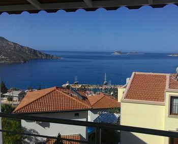 View of sea against clear blue sky