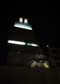 Low angle view of illuminated staircase at night