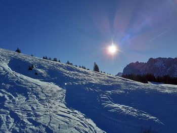Snow covered mountain against sky