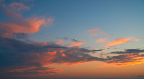 Low angle view of dramatic sky during sunset