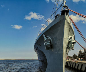 Low angle view of sailboat in sea against sky