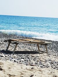 Scenic view of beach against clear sky