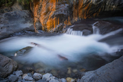 Stream flowing through rocks