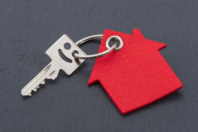 Close-up of house key on table