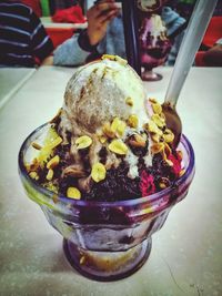 Close-up of ice cream in glass on table