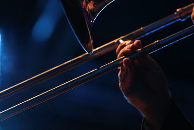 Close-up of man playing trumpet