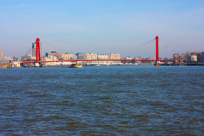 View of suspension bridge over sea