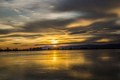 Scenic view of dramatic sky during sunset