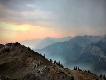 Scenic view of mountains against sky during sunset