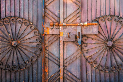 Close up shot of rusty decorative metal door