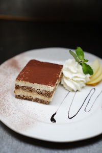 Close-up of cake served in plate on table