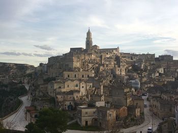 High angle view of buildings in city against sky