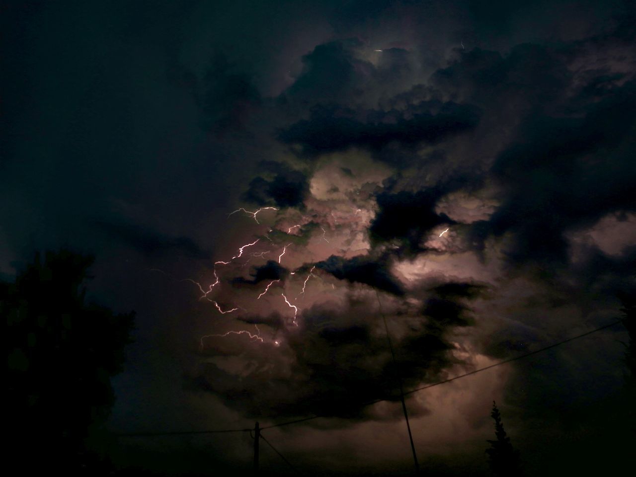 sky, cloud - sky, dramatic sky, night, no people, low angle view, storm cloud, silhouette, nature, storm, power in nature, beauty in nature, lightning, ominous, outdoors, scenics, tree, thunderstorm, forked lightning, sunset