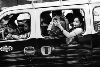 Portrait of people sitting in bus