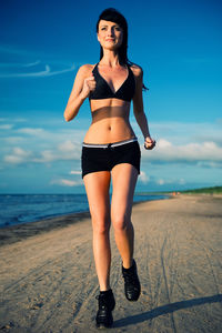 Woman jogging at beach