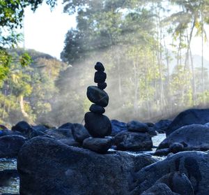 Close-up of stone stack on rock