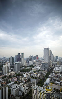 High angle view of buildings in city against sky