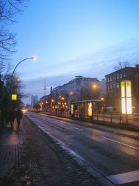 Illuminated street lights at night