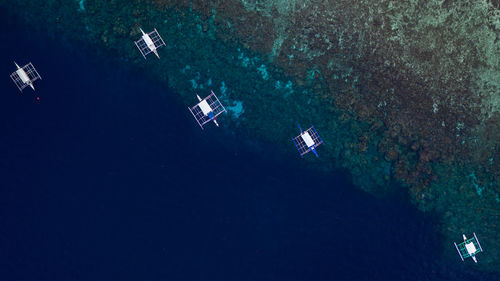 High angle view of boats in sea