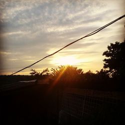 Scenic view of cloudy sky at sunset