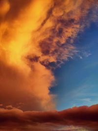 Low angle view of dramatic sky during sunset