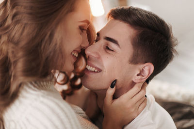 Close-up of young couple embracing