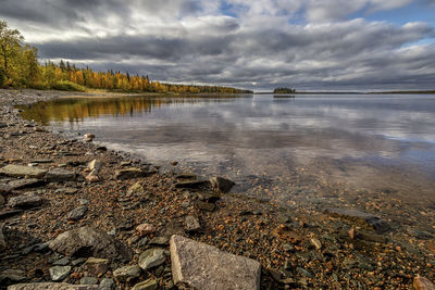 Scenic view of finnish lake against sky, in autumn