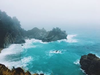 Scenic view of sea against blue sky