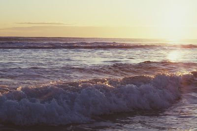 Scenic view of sea against clear sky during sunset