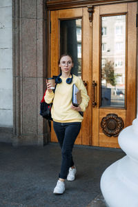 Student loan, student finance for undergraduates. outdoor portrait of student girl