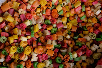 Full frame shot of colorful fryums for sale in store