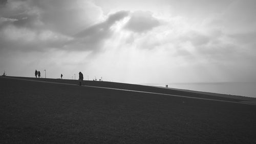 People walking on beach