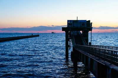 Scenic view of sea at sunset