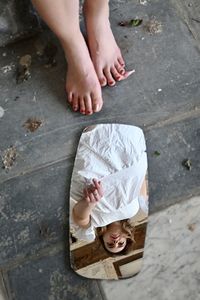 Low section of women standing on floor