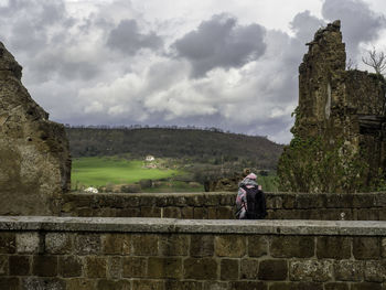 Rear view of people looking at view