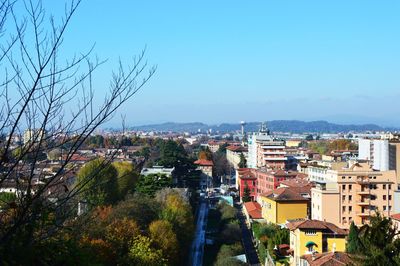 Aerial view of cityscape against clear sky