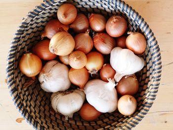 High angle view of eggs in basket on table
