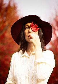 Portrait of a young woman wearing hat