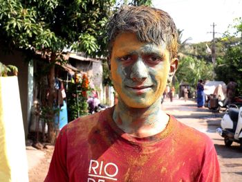 Portrait of man covered with powder paint