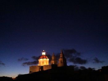 Low angle view of church against sky at dusk