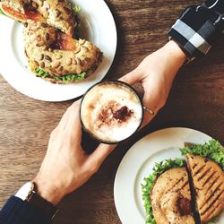 Cropped image of hand holding ice cream
