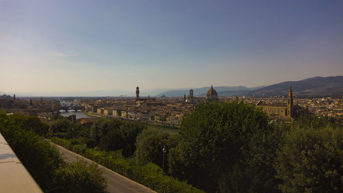 Panoramic view of city and buildings against sky