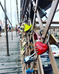 Close-up of padlocks on railing