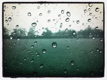 Close-up of water drops on glass