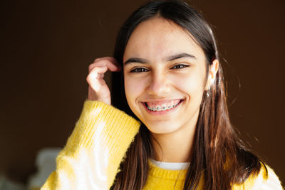 Portrait of smiling young woman