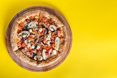 Directly above shot of pizza in bowl