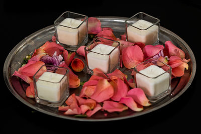 High angle view of pink roses in container