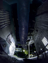 Low angle view of illuminated building at night